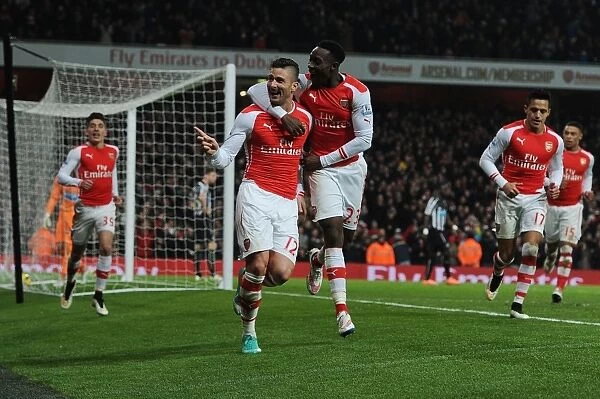 Arsenal's Olivier Giroud and Danny Welbeck Celebrate Goals Against Newcastle United (2014 / 15)