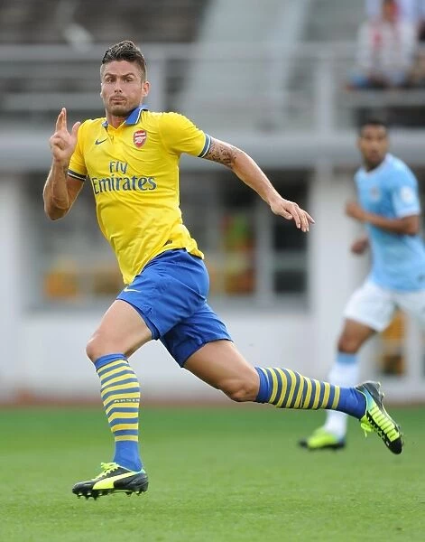 Arsenal's Olivier Giroud Faces Manchester City in Pre-Season Friendly, 2013