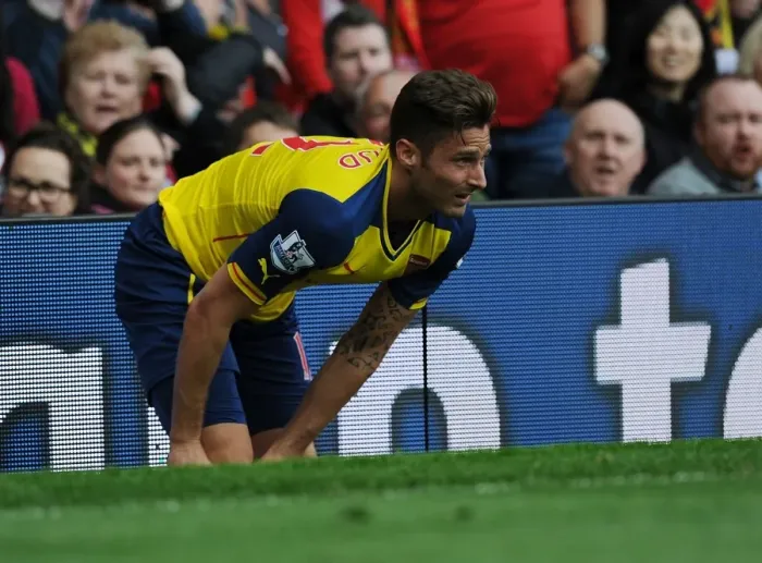 Framed Print : Arsenal's Olivier Giroud Faces Off Against Manchester United in Premier League Clash, 2014-15