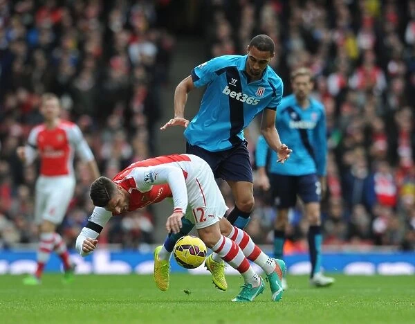 Arsenal's Olivier Giroud Fouled by Stoke's Steven Nzonzi in Premier League Clash