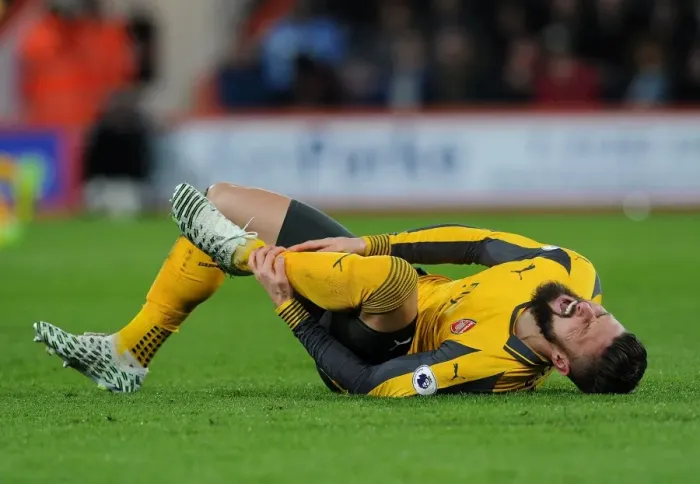 Framed Print : Arsenal's Olivier Giroud Injures Ankle Against AFC Bournemouth (2016-17) Framed Print : Arsenal's Olivier Giroud Injures Ankle Against AFC Bournemouth (2016-17)