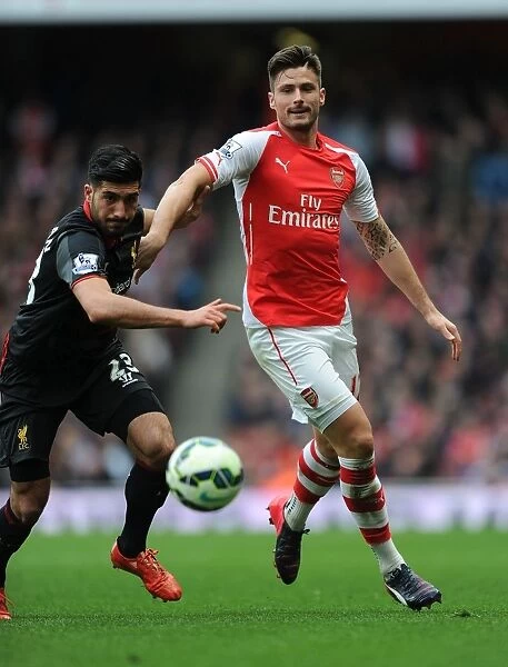 Arsenal's Olivier Giroud Outsmarts Liverpool's Emre Can in Intense Arsenal v Liverpool Clash (April 2015)