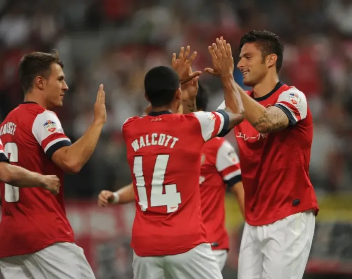 Framed Print : Arsenal's Olivier Giroud, Theo Walcott, and Aaron Ramsey Celebrate Goal Against Nagoya Grampus in 2013