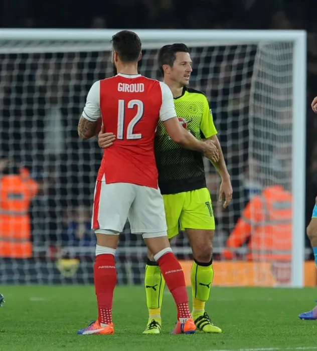 Framed Print : Arsenal's Olivier Giroud and Yann Kermorgant of Reading: A Clash in the EFL Cup Framed Print : Arsenal's Olivier Giroud and Yann Kermorgant of Reading: A Clash in the EFL Cup