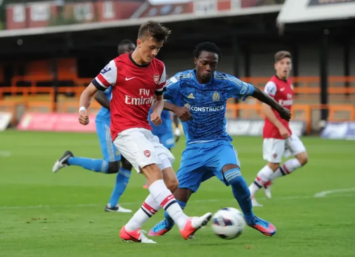 Framed Print : Arsenal's Olsson Faces Off Against Marseille's Charles in NextGen Series Clash Framed Print : Arsenal's Olsson Faces Off Against Marseille's Charles in NextGen Series Clash