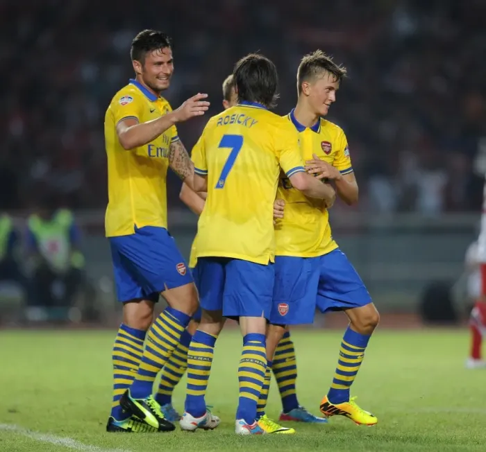 Framed Print : Arsenal's Olsson, Rosicky, and Giroud Celebrate Goal Against Indonesia All-Stars Framed Print : Arsenal's Olsson, Rosicky, and Giroud Celebrate Goal Against Indonesia All-Stars