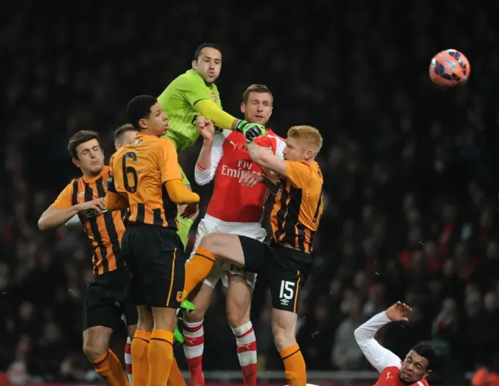 Framed Print : Arsenal's Ospina Fends Off Hull's Davies and McShane in FA Cup Clash