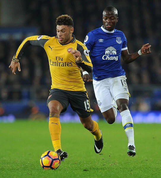 Arsenal's Oxlade-Chamberlain Clashes with Everton's Valencia in Premier League Showdown