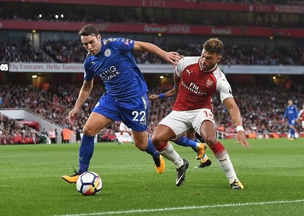 Arsenal's Oxlade-Chamberlain Faces Off Against Leicester's James in Intense Premier League Clash at Emirates Stadium