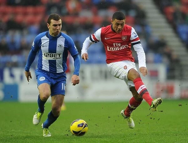 Arsenal's Oxlade-Chamberlain Fouls by McArthur in Wigan Clash (2012-13)