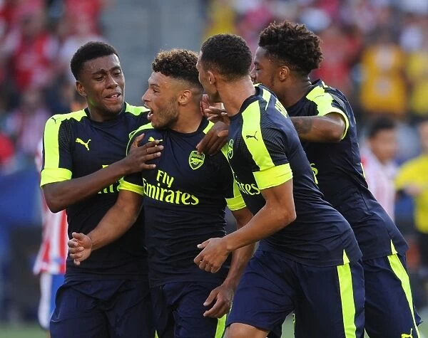 Arsenal's Oxlade-Chamberlain, Iwobi, Gibbs, and Akpom Celebrate Goals Against Chivas (2016-17)
