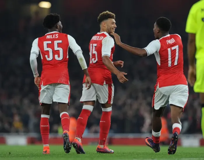 Framed Print : Arsenal's Oxlade-Chamberlain, Maitland-Niles, and Iwobi Celebrate Goals Against Reading in EFL Cup