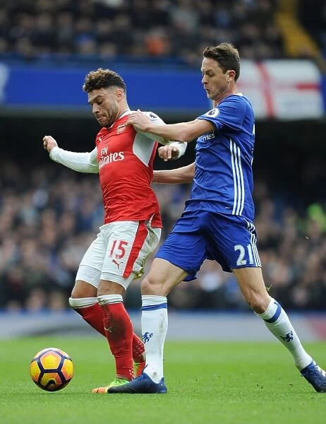 Arsenal's Oxlade-Chamberlain Outmaneuvers Chelsea's Matic in Premier League Clash