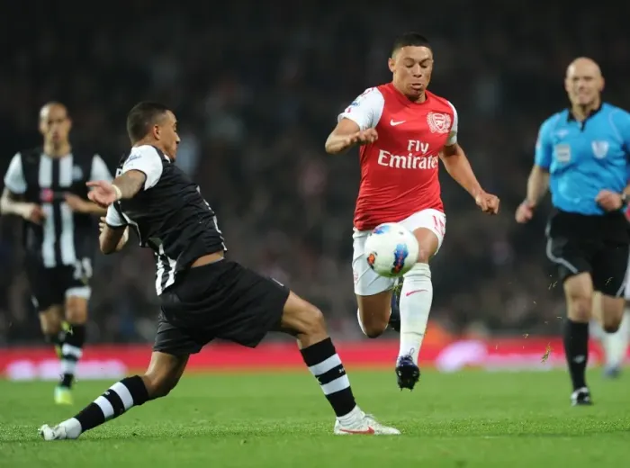 Framed Print : Arsenal's Oxlade-Chamberlain Outmaneuvers Newcastle's Simpson in 2011-12 Premier League Clash Framed Print : Arsenal's Oxlade-Chamberlain Outmaneuvers Newcastle's Simpson in 2011-12 Premier League Clash