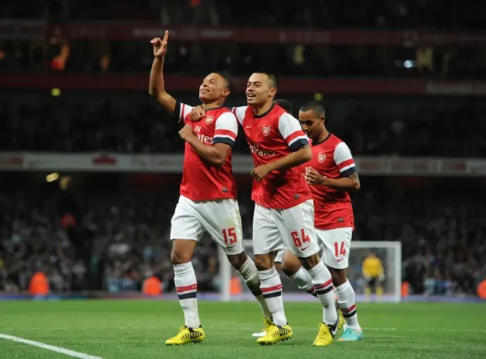Framed Print : Arsenal's Oxlade-Chamberlain Scores in Capital One Cup Win vs Coventry City