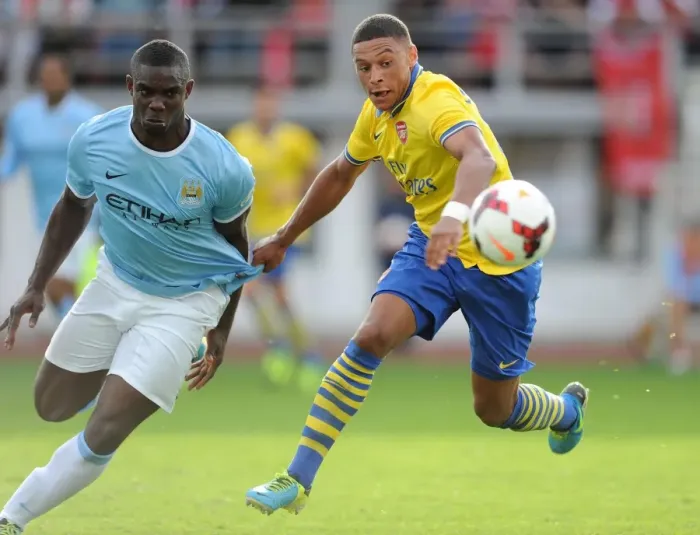 Framed Print : Arsenal's Oxlade-Chamberlain vs. Richards: A Pre-Season Battle in Helsinki