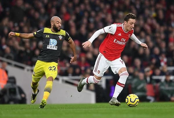 Arsenal's Ozil Clashes with Southampton's Redmond in Premier League Showdown