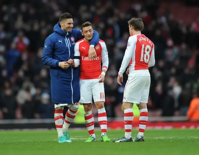 Framed Print : Arsenal's Ozil, Giroud, and Monreal: United in Action against Stoke City (2014-15) Framed Print : Arsenal's Ozil, Giroud, and Monreal: United in Action against Stoke City (2014-15)