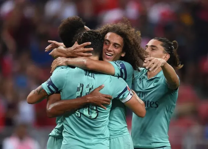 Framed Print : Arsenal's Ozil and Guendouzi: Celebrating a Goal Against Paris Saint-Germain in the 2018 International Champions Cup