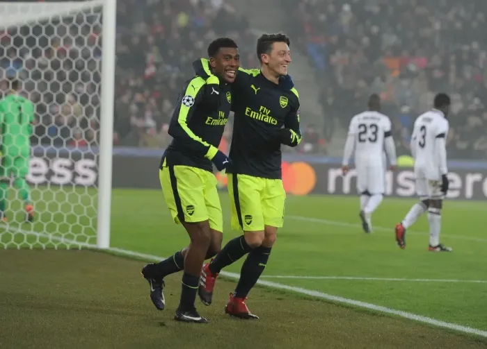Framed Print : Arsenal's Ozil and Iwobi Celebrate Goals Against FC Basel in 2016-17 UEFA Champions League