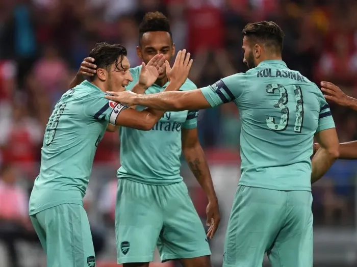 Framed Print : Arsenal's Ozil and Kolasinac Celebrate Goal Against Paris Saint-Germain, 2018