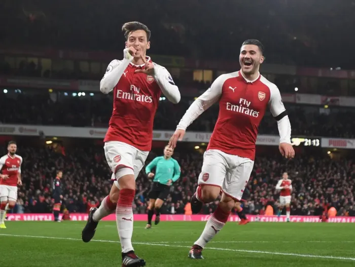 Framed Print : Arsenal's Ozil and Kolasinac: Unstoppable Duo Celebrates Fourth Goal vs. Huddersfield Town (2017-18)