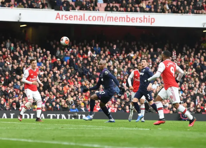 Framed Print : Arsenal's Ozil-Lacazette Duo Scores Dramatic Win Against West Ham United in Premier League Framed Print : Arsenal's Ozil-Lacazette Duo Scores Dramatic Win Against West Ham United in Premier League