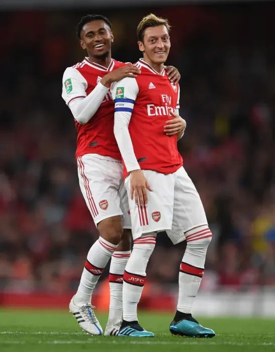 Framed Print : Arsenal's Ozil and Nelson in Action against Nottingham Forest in Carabao Cup Third Round Framed Print : Arsenal's Ozil and Nelson in Action against Nottingham Forest in Carabao Cup Third Round