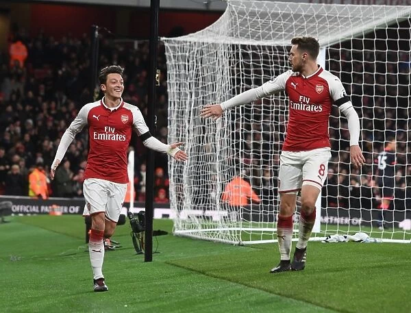 Arsenal's Ozil and Ramsey Celebrate Third Goal vs. Huddersfield Town, 2017-18 Season