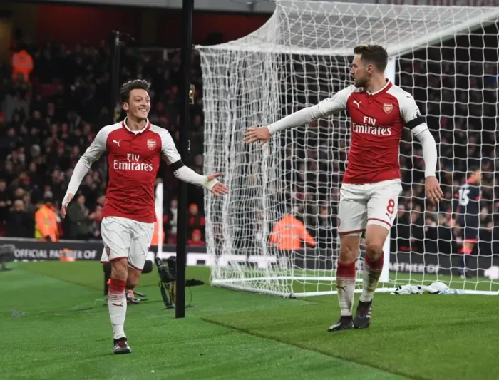 Framed Print : Arsenal's Ozil and Ramsey Celebrate Third Goal vs. Huddersfield Town, 2017-18 Season Framed Print : Arsenal's Ozil and Ramsey Celebrate Third Goal vs. Huddersfield Town, 2017-18 Season