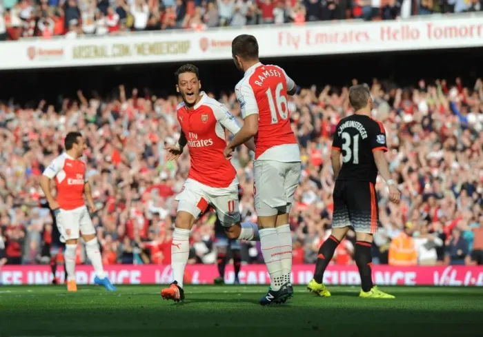 Framed Print : Arsenal's Ozil and Ramsey: Celebrating Goals Against Manchester United in the 2015 / 16 Premier League