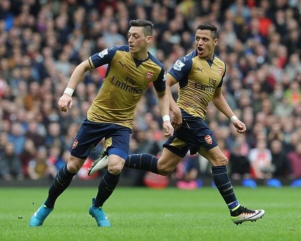 Arsenal's Ozil and Sanchez in Action: A Battle at The Boleyn Ground, West Ham United vs. Arsenal, Premier League 2015-16