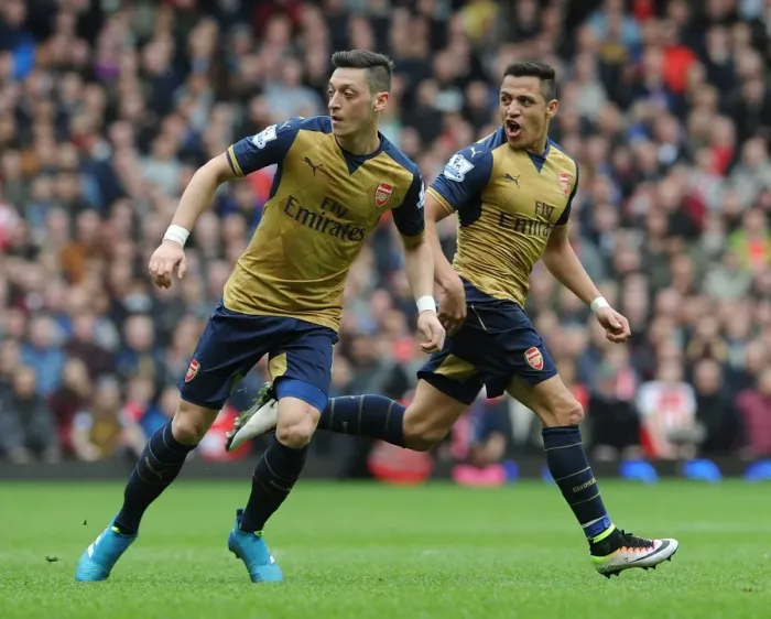 Framed Print : Arsenal's Ozil and Sanchez in Action: A Battle at The Boleyn Ground, West Ham United vs. Arsenal, Premier League 2015-16