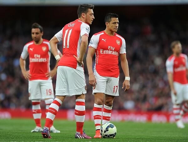 Arsenal's Ozil and Sanchez in Action: A Premier League Showdown (Arsenal vs Swansea City, 2014 / 15)