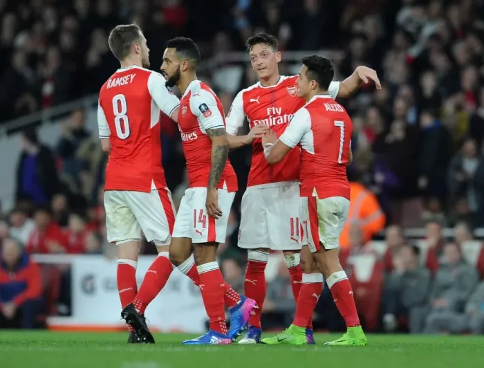 Framed Print : Arsenal's Ozil and Sanchez Celebrate Third Goal in FA Cup Quarter-Final vs. Lincoln City Framed Print : Arsenal's Ozil and Sanchez Celebrate Third Goal in FA Cup Quarter-Final vs. Lincoln City