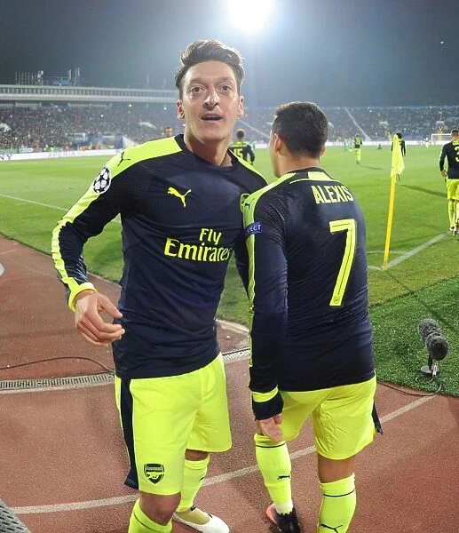 Arsenal's Ozil and Sanchez: Unstoppable Duo Celebrates Goals in Arsenal's Victory over Ludogorets (2016-17 UEFA Champions League)