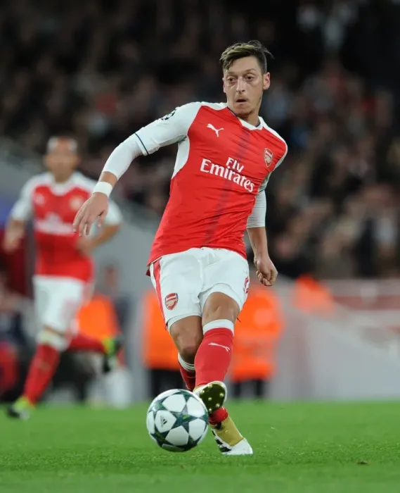 Framed Print : Arsenal's Ozil Shines in Champions League Clash Against Ludogorets