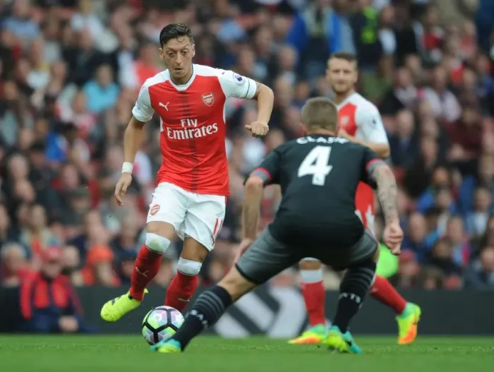 Framed Print : Arsenal's Ozil vs. Southampton's Clasie: A Battle in the 2016-17 Premier League Framed Print : Arsenal's Ozil vs. Southampton's Clasie: A Battle in the 2016-17 Premier League