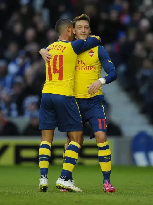 Framed Print : Arsenal's Ozil and Walcott Celebrate FA Cup Double Strike Against Brighton Framed Print : Arsenal's Ozil and Walcott Celebrate FA Cup Double Strike Against Brighton