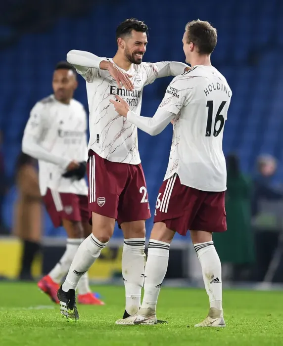 Framed Print : Arsenal's Pablo Mari and Rob Holding Celebrate Victory Over Brighton & Hove Albion in Premier League