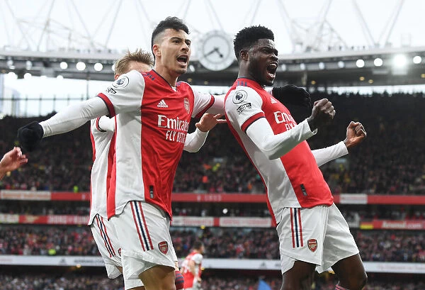Arsenal's Partey, Martinelli, and Odegaard Celebrate Goal Against Leicester City (2021-22)