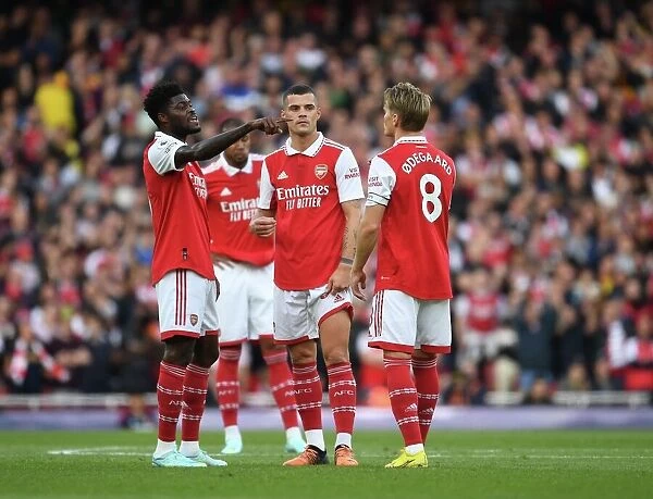 Arsenal's Partey, Xhaka, and Odegaard: United Front Against Liverpool in 2022-23 Premier League