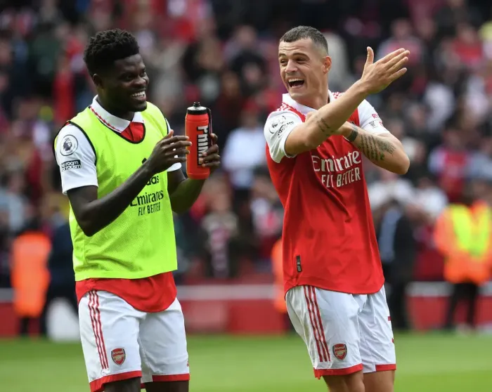 Framed Print : Arsenal's Partey and Xhaka Share a Moment After Arsenal v Tottenham Premier League Clash (2022-23) Framed Print : Arsenal's Partey and Xhaka Share a Moment After Arsenal v Tottenham Premier League Clash (2022-23)