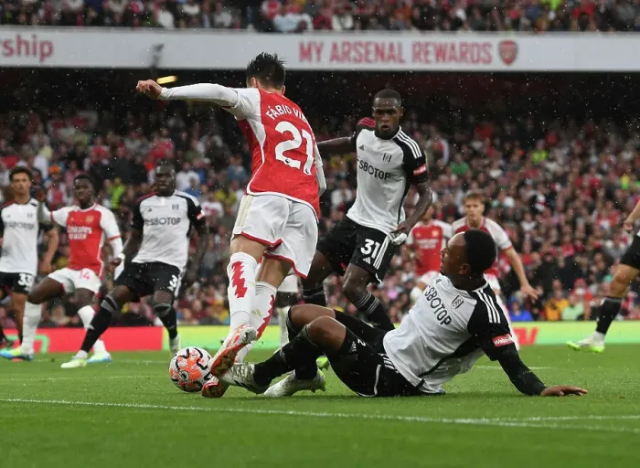 Framed Print : Arsenal's Penalty Victory: Fulham's Tete Trips Fabio Vieira Framed Print : Arsenal's Penalty Victory: Fulham's Tete Trips Fabio Vieira