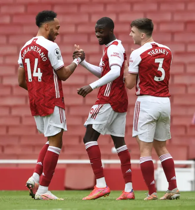 Framed Print : Arsenal's Pepe and Aubameyang: Celebrating a Winning Duo in Arsenal's Victory Against Brighton (2020-21 Premier League) Framed Print : Arsenal's Pepe and Aubameyang: Celebrating a Winning Duo in Arsenal's Victory Against Brighton (2020-21 Premier League)