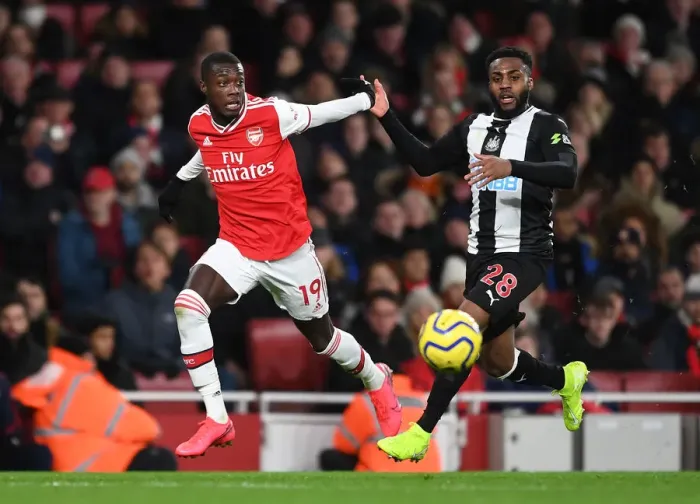 Framed Print : Arsenal's Pepe Clashes with Newcastle's Rose in Premier League Showdown Framed Print : Arsenal's Pepe Clashes with Newcastle's Rose in Premier League Showdown