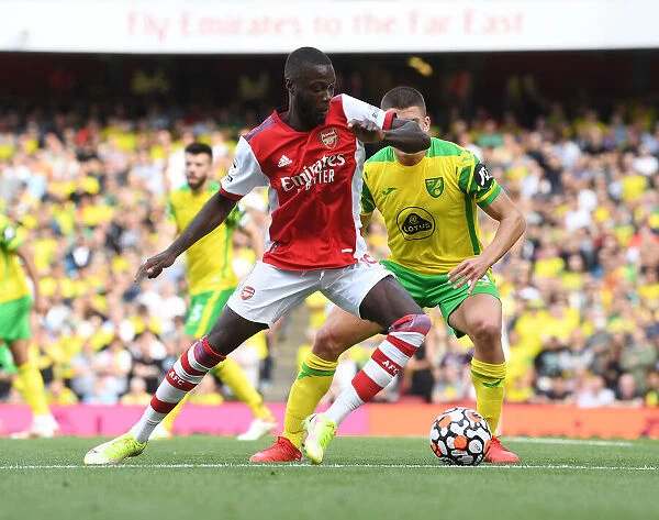 Arsenal's Pepe Clashes with Norwich's Tzolis in Premier League Showdown