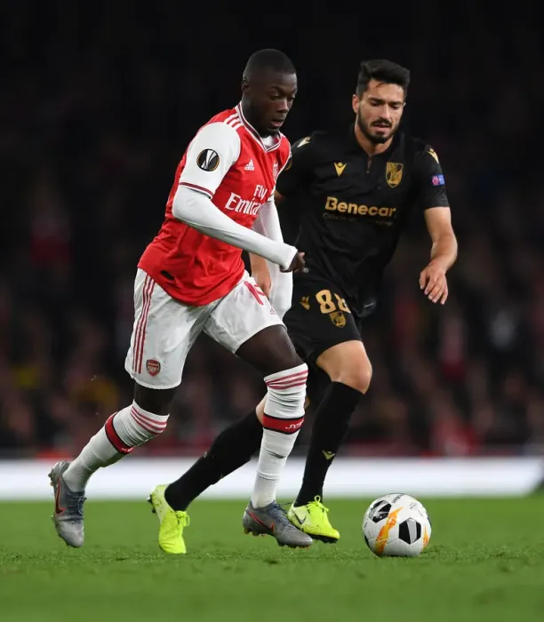 Framed Print : Arsenal's Pepe Clashes with Vitoria's Pepe in Europa League Showdown