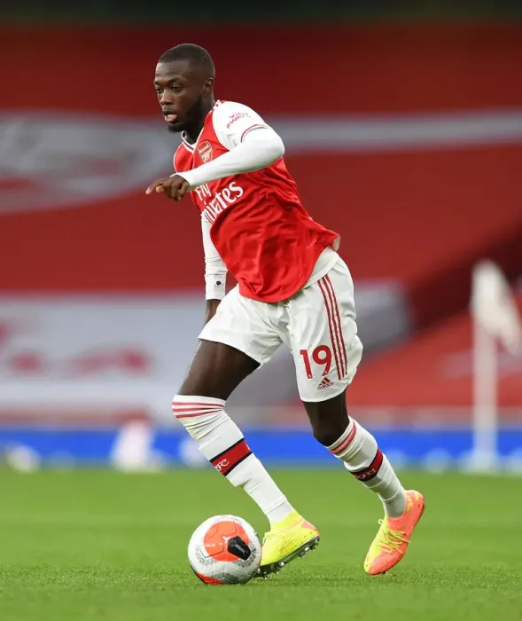Framed Print : Arsenal's Pepe Faces Liverpool in Empty Emirates Stadium (2019-20) Framed Print : Arsenal's Pepe Faces Liverpool in Empty Emirates Stadium (2019-20)