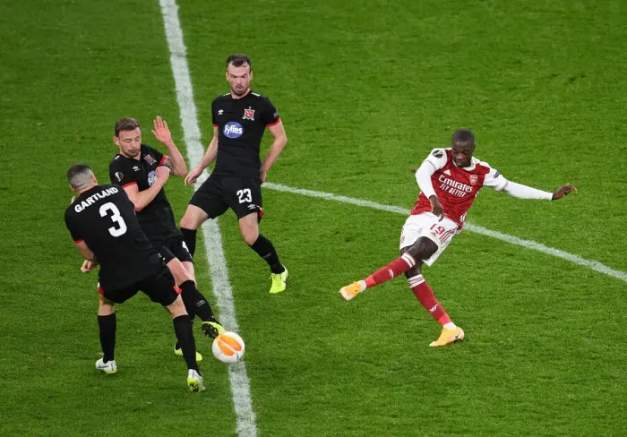 Framed Print : Arsenal's Pepe Faces Off Against Dundalk Trio in Empty Emirates Europa League Clash (2020-21) Framed Print : Arsenal's Pepe Faces Off Against Dundalk Trio in Empty Emirates Europa League Clash (2020-21)